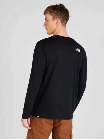 THE NORTH FACE T-shirt i svart