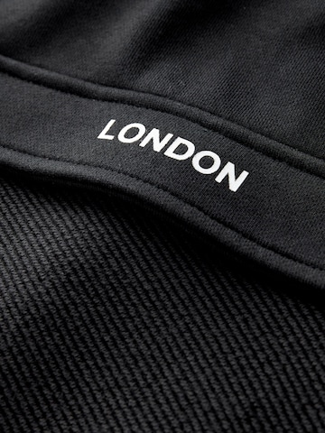 smALLSAINTS - Sweatshirt em preto