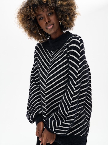 Blue Shadow Sweater in Black