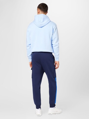 Nike Sportswear Ozke Kargo hlače | modra barva