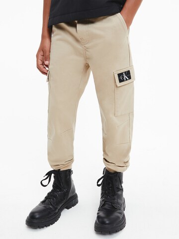 Calvin Klein Jeans Tapered Hose in Beige: predná strana