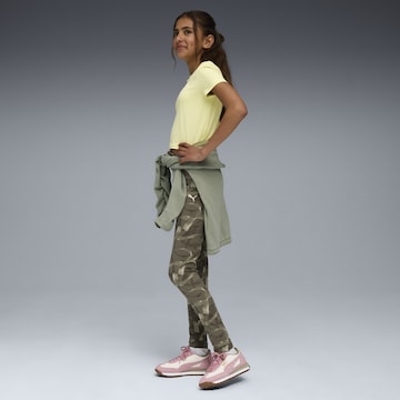 PUMA Slim fit Leggings 'Bowtique' in Green