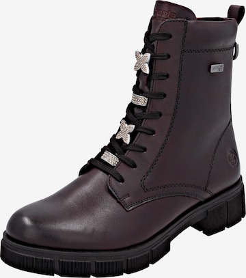 Bottines à lacets REMONTE en rouge : devant