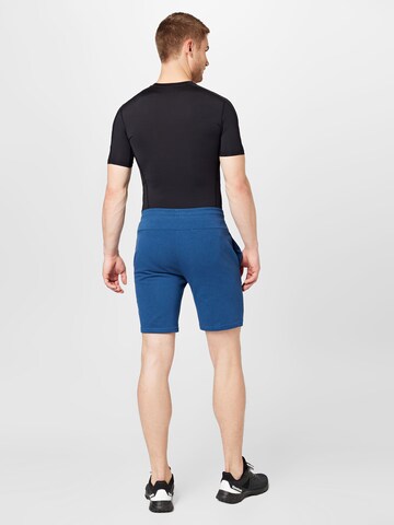 4F Štandardný strih Športové nohavice - Modrá