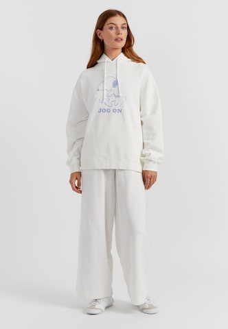 Chinti & Parker - Sudadera 'Jog On Snoopy' en beige