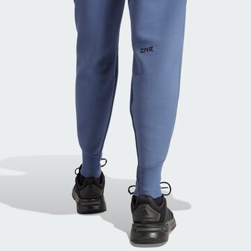 ADIDAS SPORTSWEAR Tapered Urheiluhousut 'Z.N.E. Premium' värissä sininen