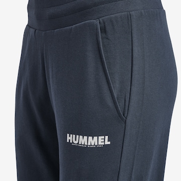 Effilé Pantalon de sport 'Legacy' Hummel en bleu