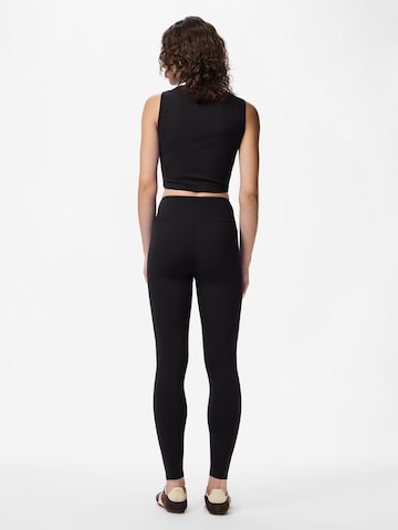 PIECES - Top en negro