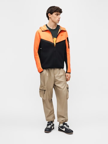 Nike Sportswear Tréning dzseki 'Tech Fleece' - narancs