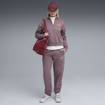 PUMA Tapered Sportbroek in Lila