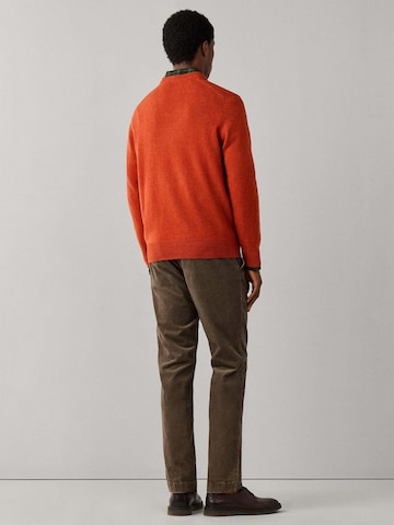 Pullover di Hackett London in arancione