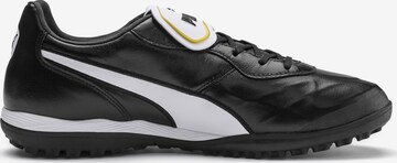 Chaussure de foot 'King' PUMA en noir