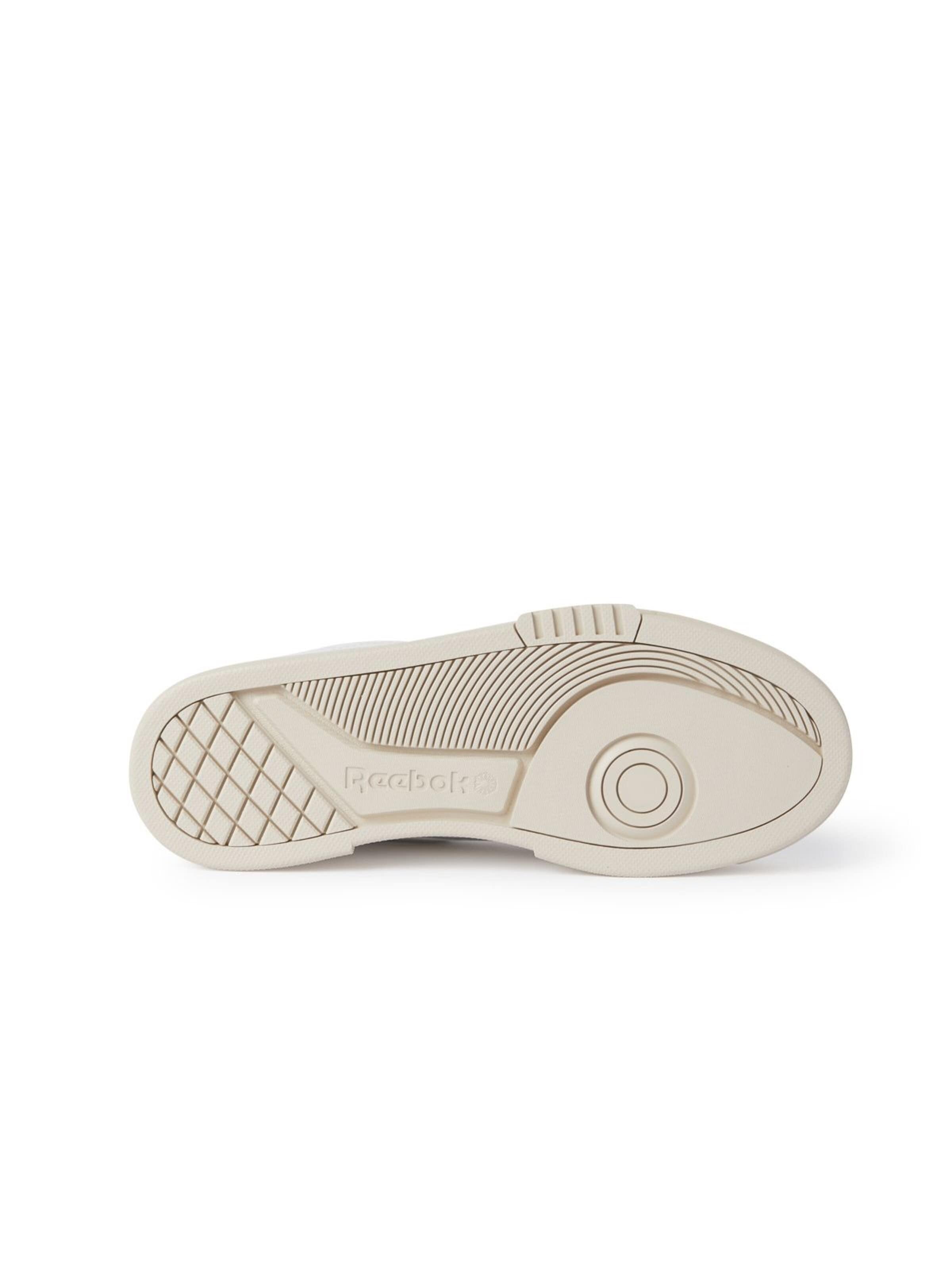Reebok - Zapatos con cordón en blanco