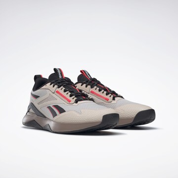 Chaussure de course Reebok en beige