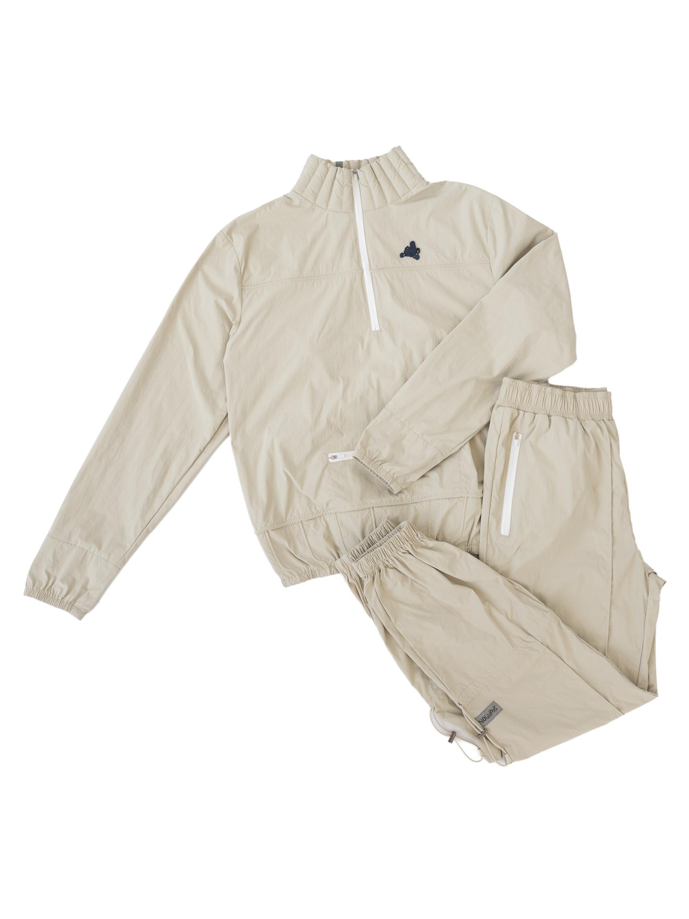 Skurpion ApS Træningsdragt 'Tracksuit' i beige: forside