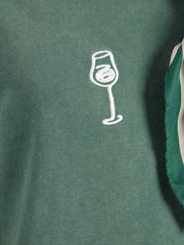 T-Shirt 'WELLNESS DESTINATIONS' Abercrombie & Fitch en vert