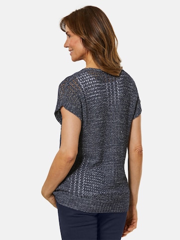 Goldner Pullover in Blau