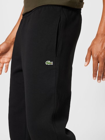 Effilé Pantalon de sport Lacoste Sport en noir