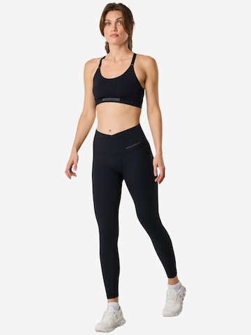 SWEDEMOUNT Skinny Sportbroek 'Core' in Zwart: voorkant