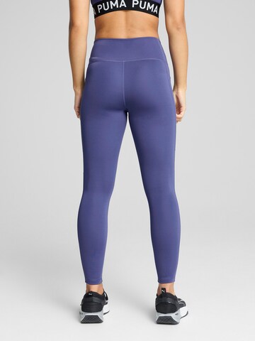 PUMA Skinny Urheiluhousut 'TAD ESSENTIAL' värissä sininen