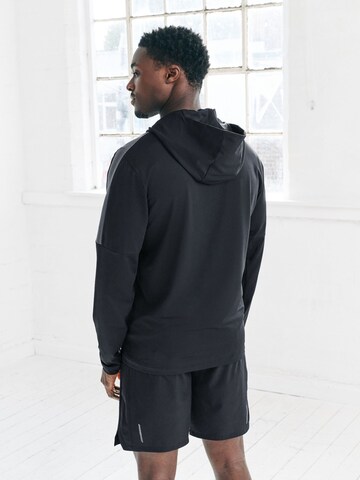 Next Treenitakki värissä musta