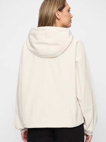 New View Performance Jacket in Beige