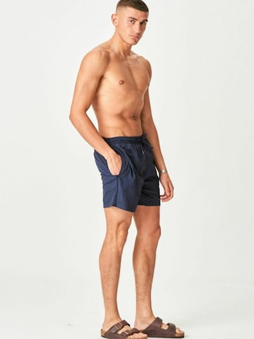 Shorts de bain ' Premium Badeshorts ' TEESHOPPEN en bleu