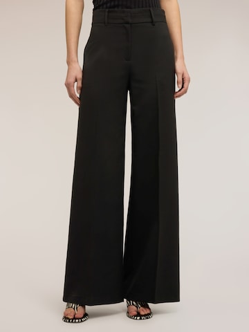 MOTIVI Wide leg Pants in Black: front
