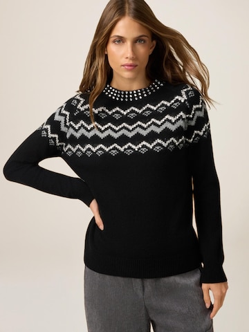 Pullover di oltre in nero