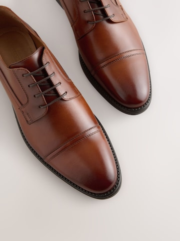 Next Čevlji na vezalke | rjava barva