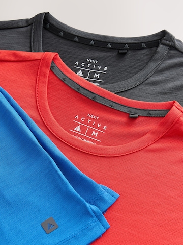 T-Shirt fonctionnel Next en bleu