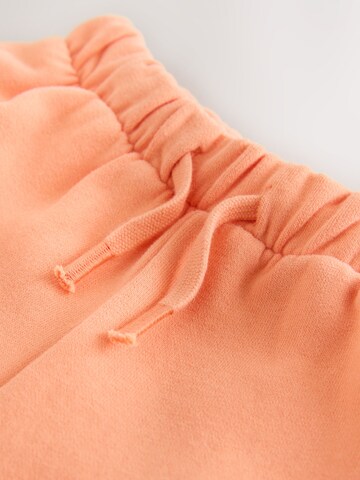 Next tavaline Püksid, värv oranž