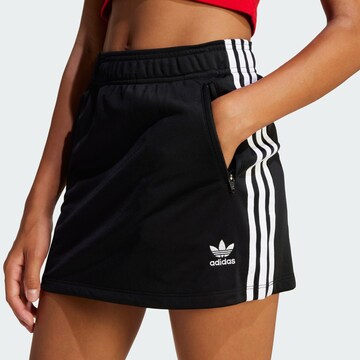 ADIDAS ORIGINALS - Falda 'Firebird' en negro