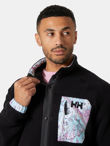 Veste en polaire fonctionnelle 'Panorama Pile Snap' HELLY HANSEN en noir