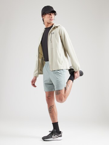 UNDER ARMOUR Regular Sports trousers in Green