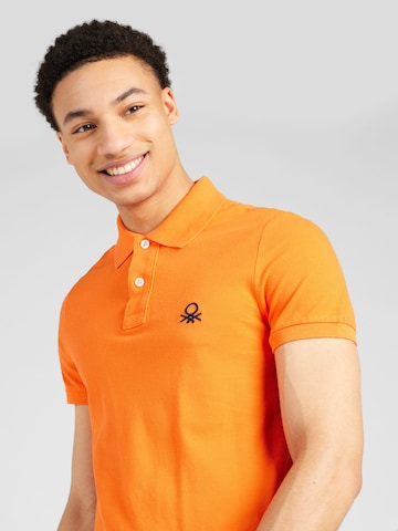 UNITED COLORS OF BENETTON Poloshirt in Orange