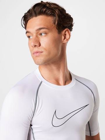 NIKE Funktionsshirt in Weiß