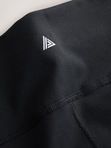 Skinny Leggings di Next in nero