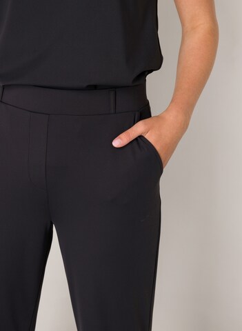 BASE LEVEL Flared Pants in Black