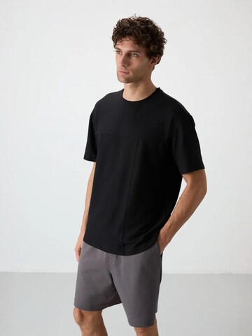 Tommy Life T-Shirts in Schwarz