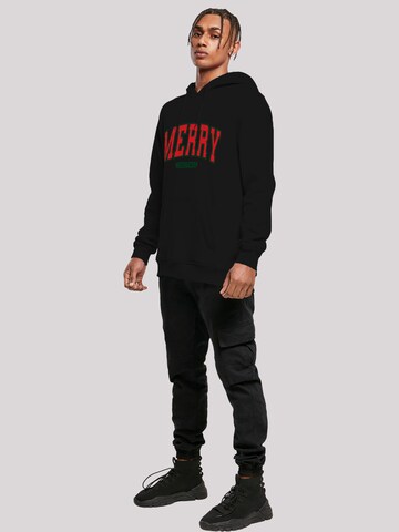 F4NT4STIC Sweatshirt 'Merry Christmas Varsity Retro' in Zwart