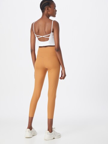 Girlfriend Collective Skinny Workout Pants in Beige
