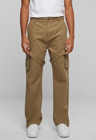 Karl Kani Loose fit Cargo Pants in Green: front