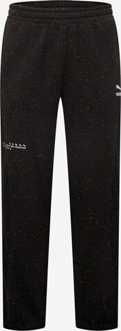 PUMA - Tapered Pantalón en negro: frente