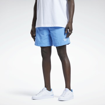 Reebok Classics Workout Pants in Blue: front