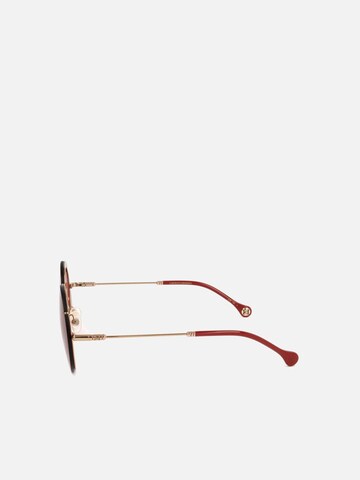 Lunettes de soleil Carolina Herrera en or