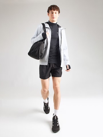 UNDER ARMOUR - Chaqueta deportiva 'Unstoppable' en gris