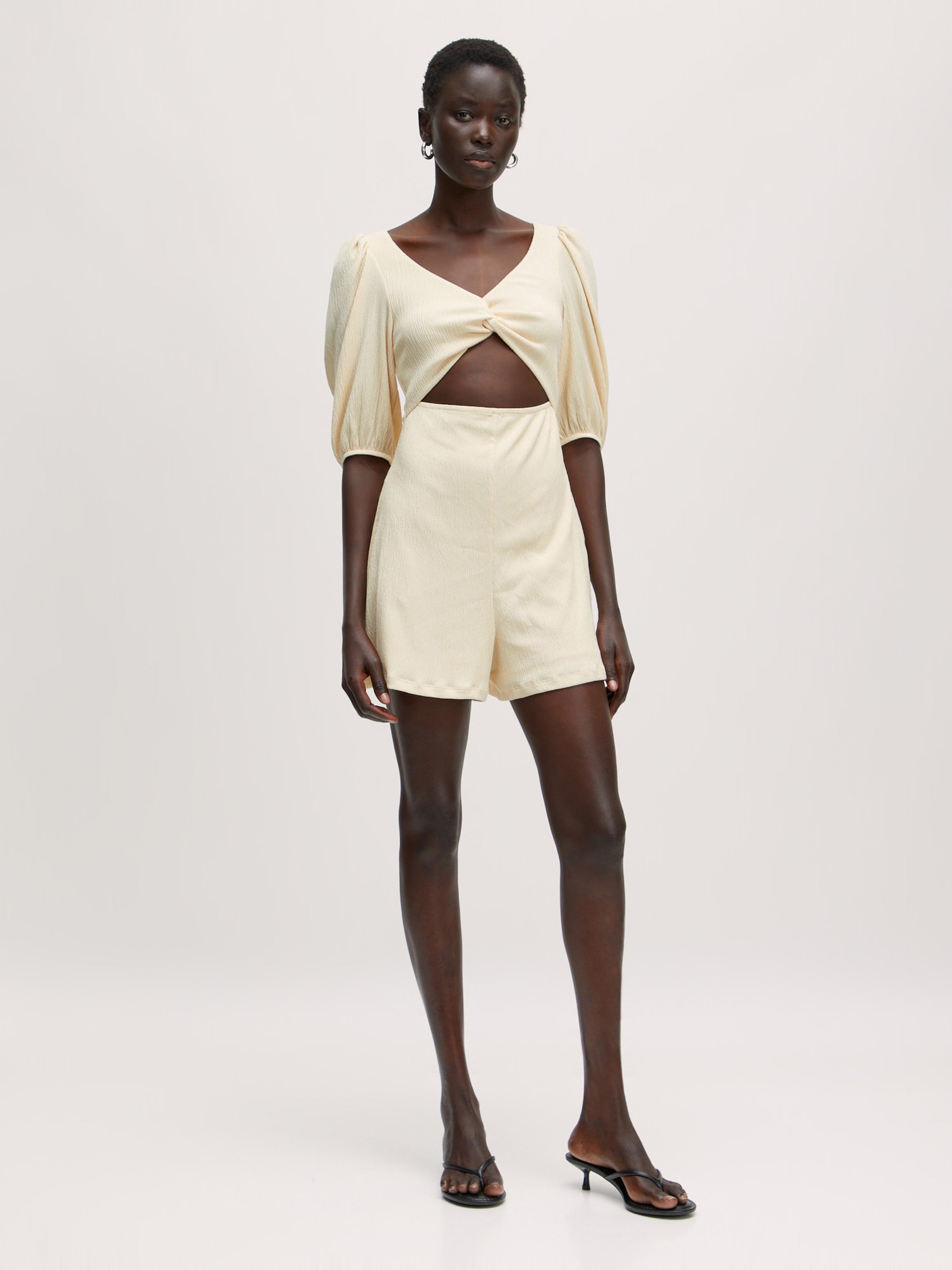 EDITED Produkte Jumpsuit 'Xylia' beige