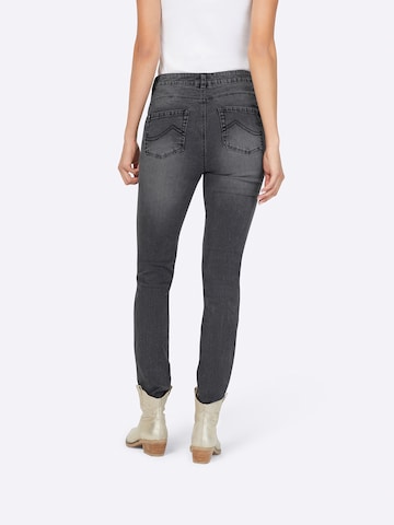 Skinny Jeans di heine in grigio