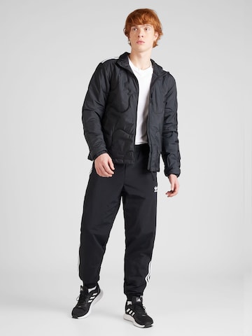 ADIDAS SPORTSWEAR Športna jakna 'Nuganic' | črna barva